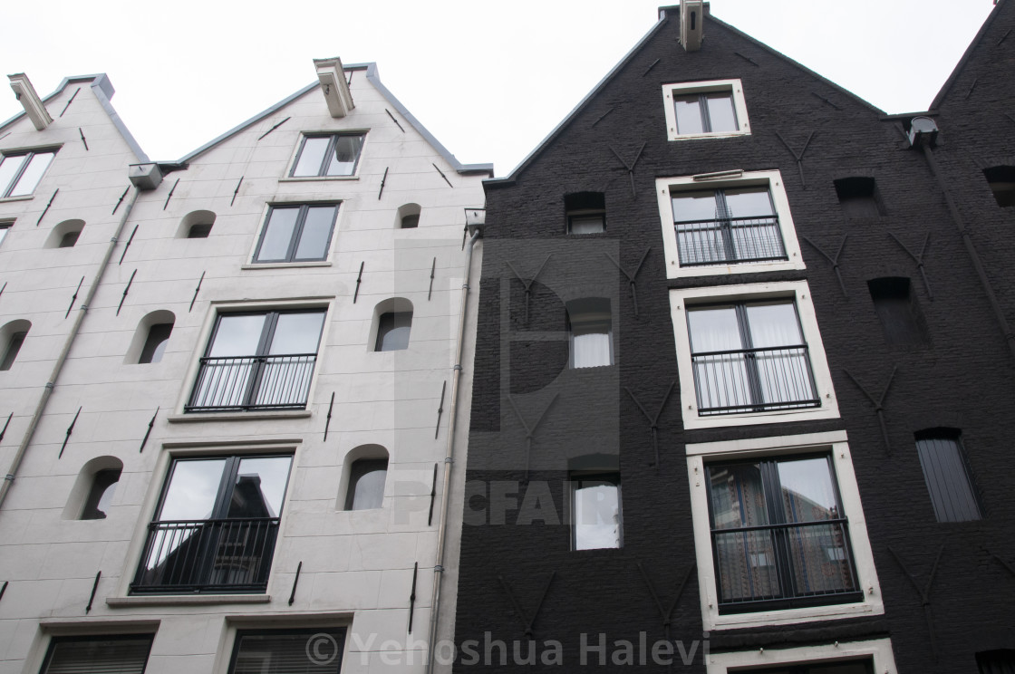 "Black and white Amsterdam apartment buildings" by Yehoshua Halevi - $6.08 "Black and white Amsterdam apartment buildings" stock image