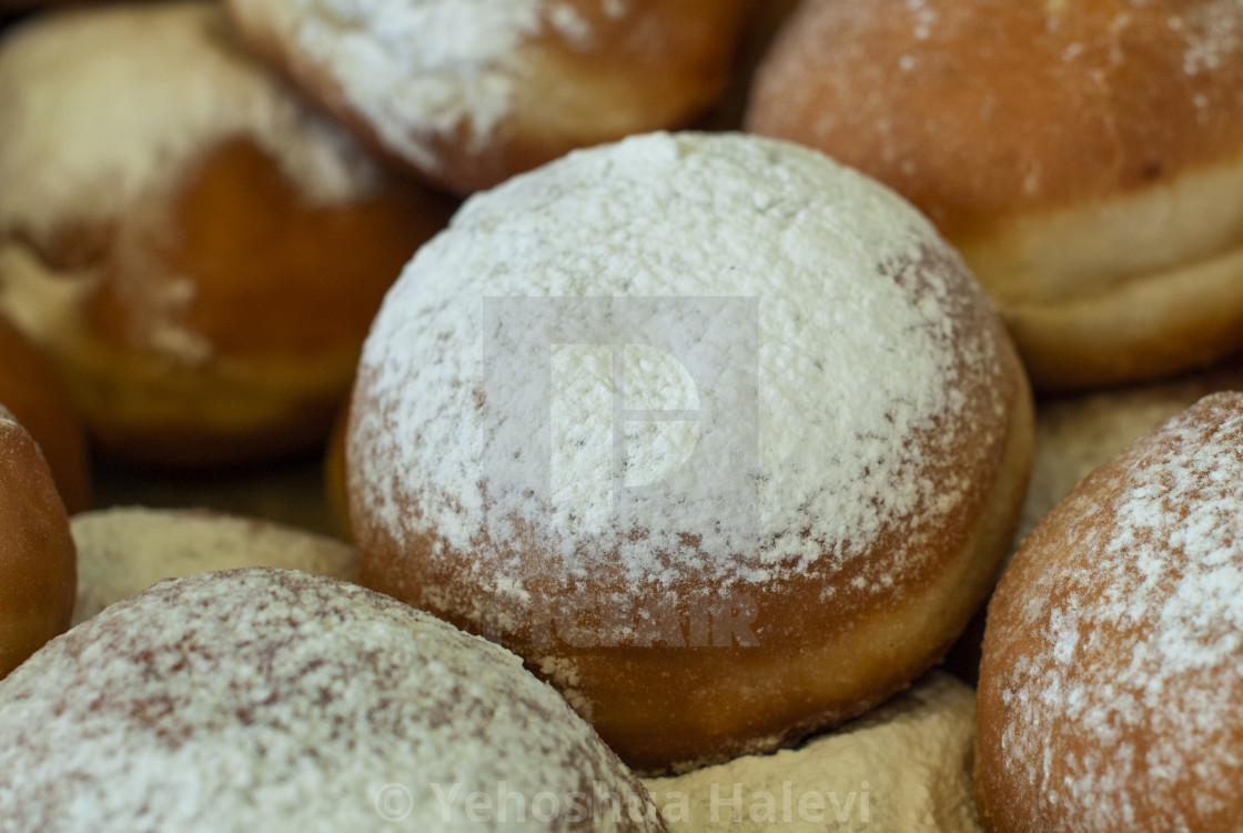 "Donuts for sale in Jerusalem during Chanukah." by Yehoshua Halevi - $4.86 "Donuts for sale in Jerusalem during Chanukah." stock image