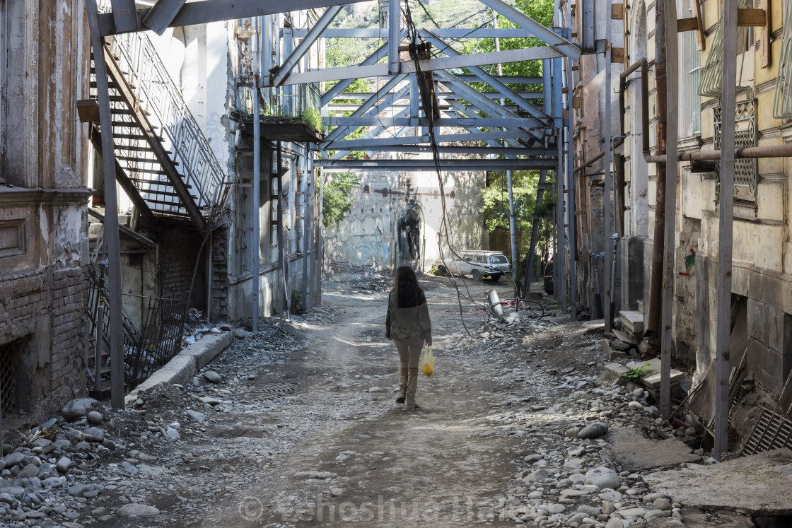 "A woman walks through Old Town, Tbilisi, Georgia" by Yehoshua Halevi - $6.08 "A woman walks through Old Town, Tbilisi, Georgia" stock image