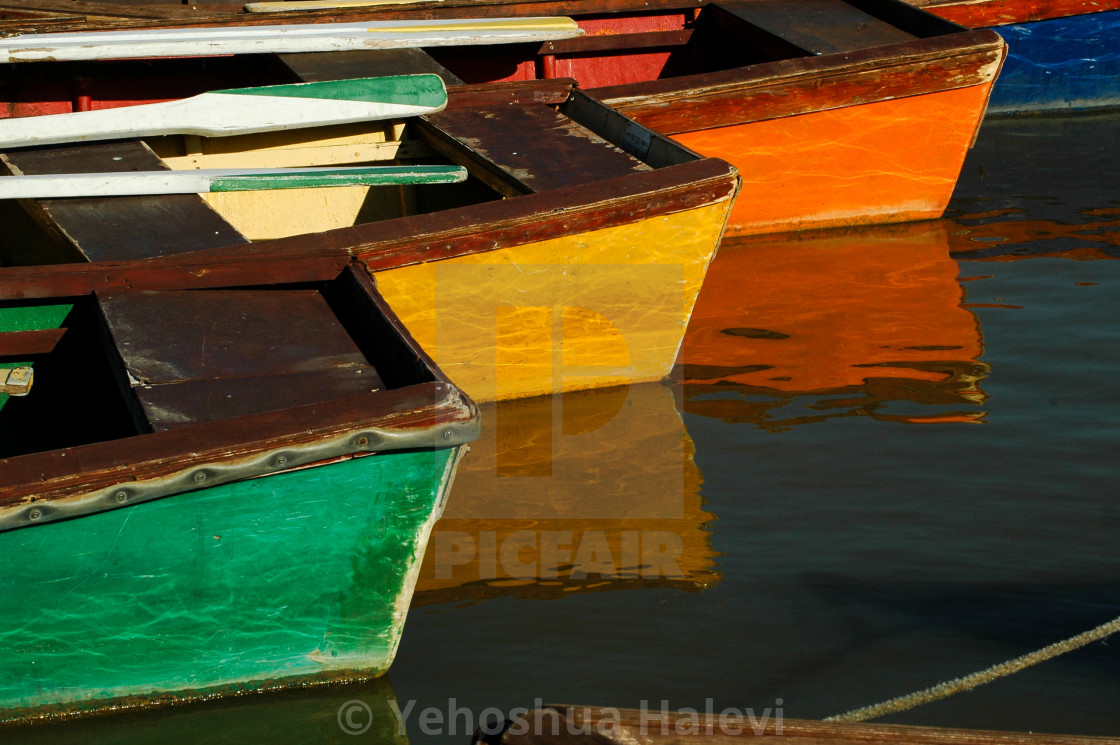 "Colorful row boats reflected in a pond in a park in Tel Aviv, Israel." by Yehoshua Halevi - $6.09 "Colorful row boats reflected in a pond in a park in Tel Aviv, Israel." stock image