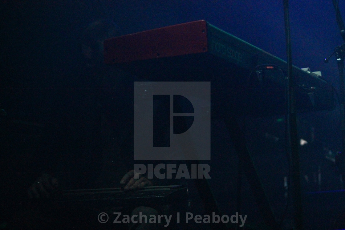 "Slide Guitar player next to Keyboard" by Zachary I Peabody - £10.00 "Slide Guitar player next to Keyboard" stock image