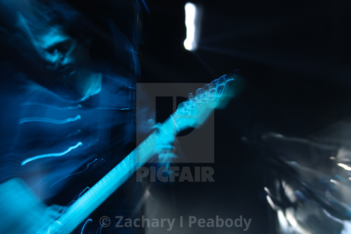 "Blurred Guitar Player" by Zachary I Peabody - £10.00 "Blurred Guitar Player" stock image