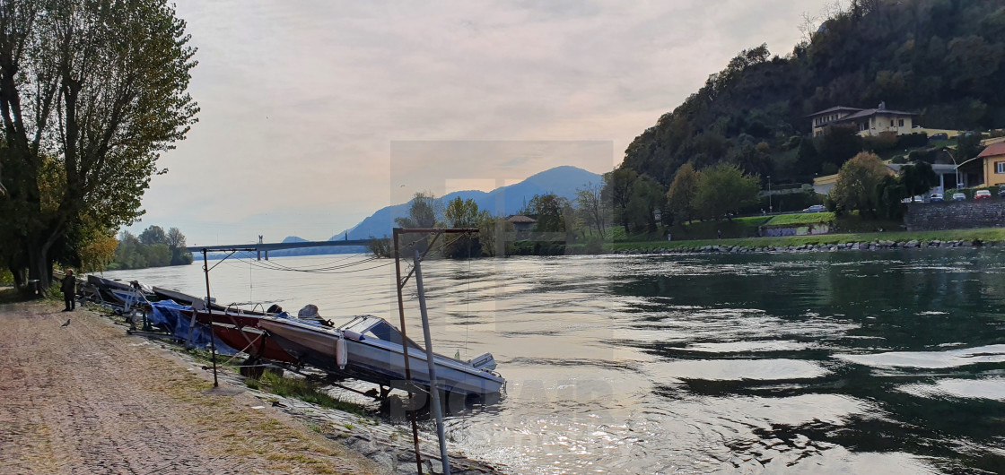 "Boats on the Adda River Lake Como" stock image