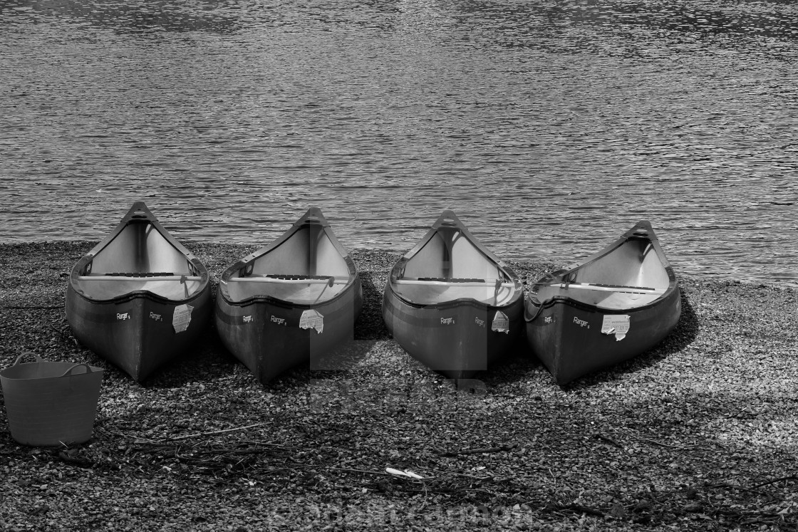 "thames canoes in black and white" stock image