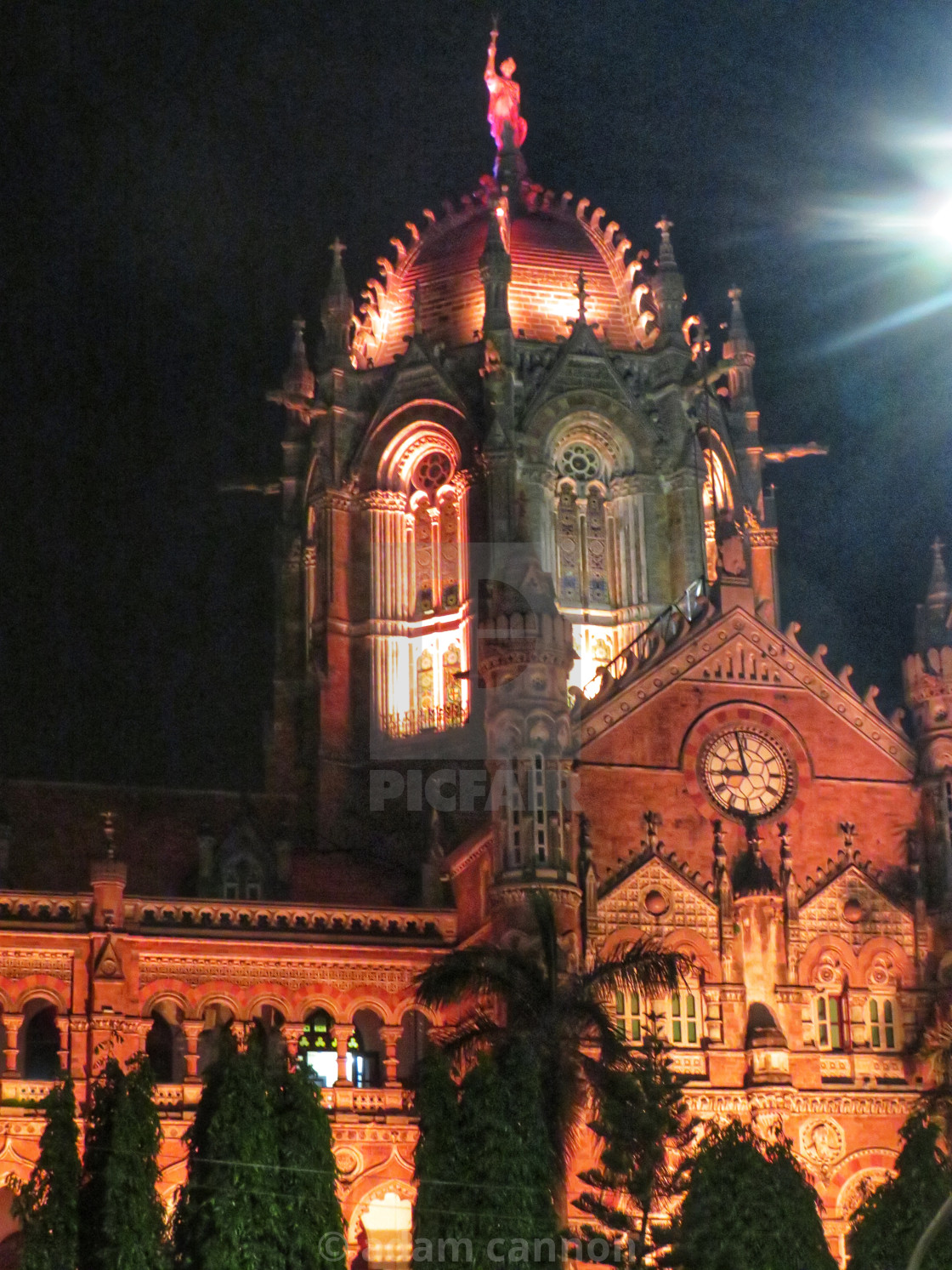 "mumbai train station at night" stock image