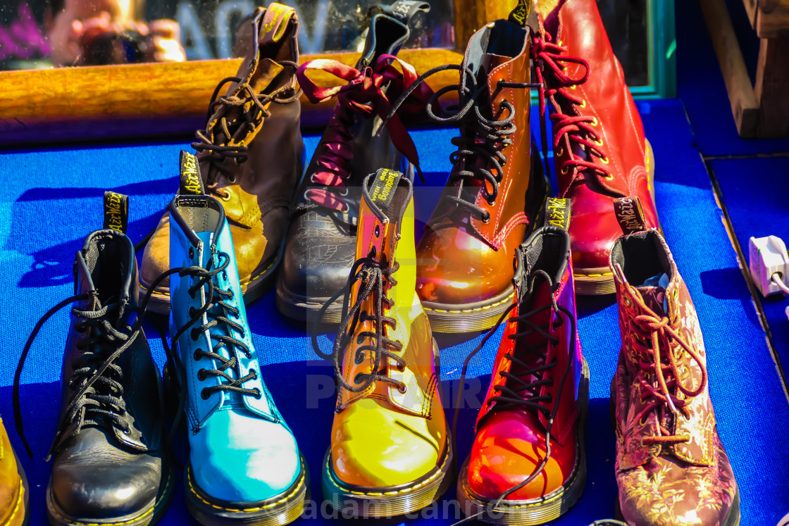 "colourful doc martins for sale at at the brick lane market" stock image