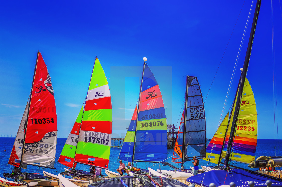 "Colourful yachts on Brighton beach" stock image