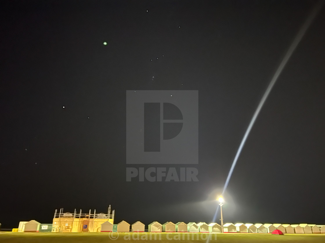 "Hove beach huts on a starry night" stock image