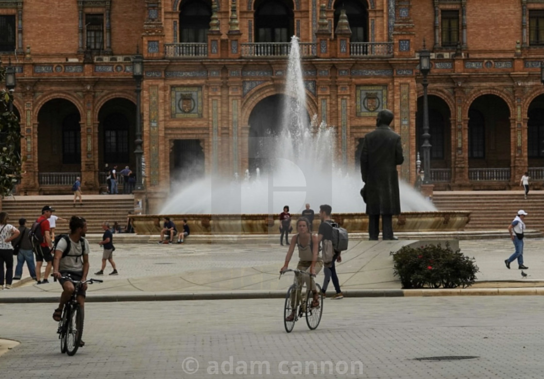 "cyclists at the Plaza de espana" stock image