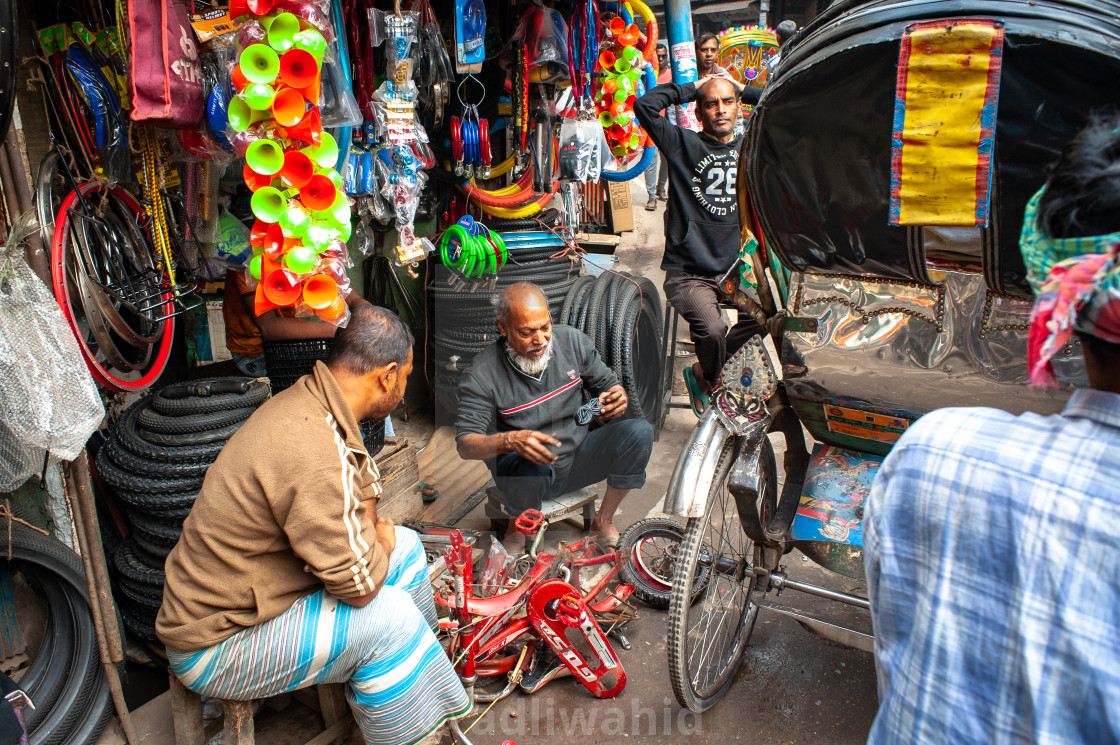 "At Bicycle repair shop - Dhaka, Bangladesh" stock image