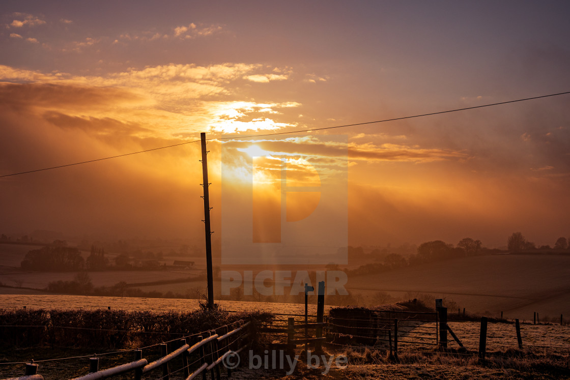 "misty sunset" stock image