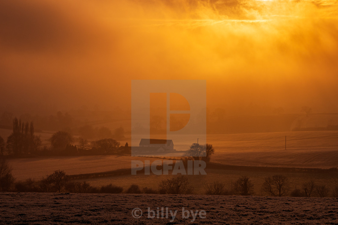 "misty sunset" stock image