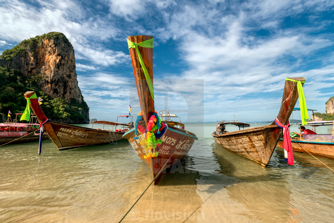"Longtail boats moored on Railay beach, Krabi, Thailand" stock image