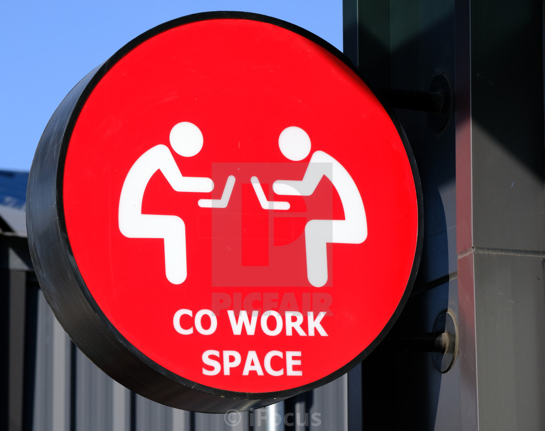 "Circular co-working space on red background" stock image