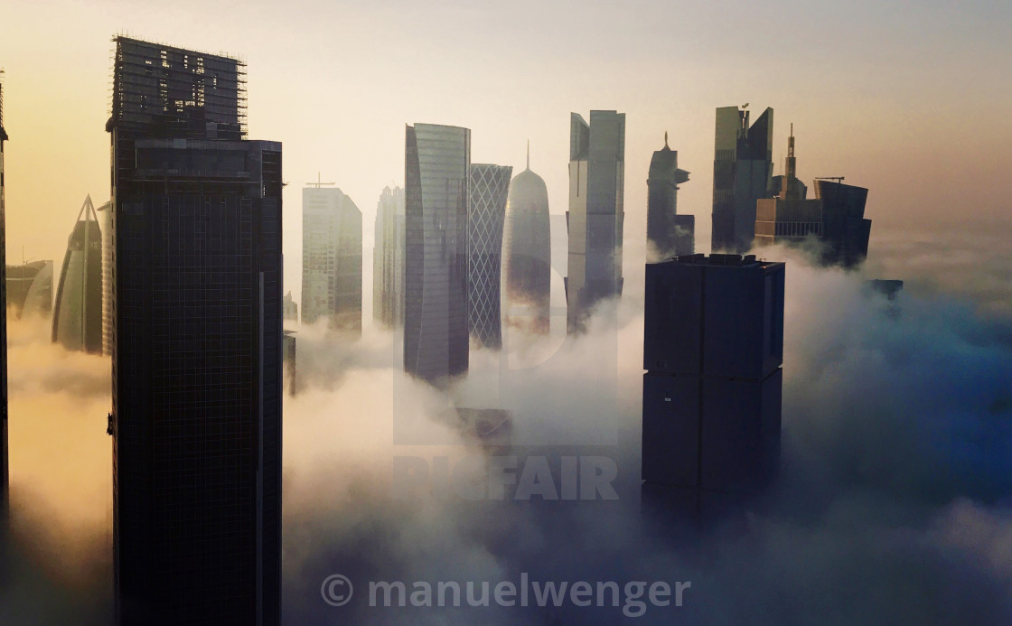 "Skyscrapers and Fog in Qatar" by - $15.21 "Skyscrapers and Fog in Qatar" stock image