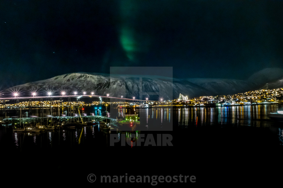 "Norway, Northern lights above Tromsø city" by - $10.04 "Norway, Northern lights above Tromsø city" stock image