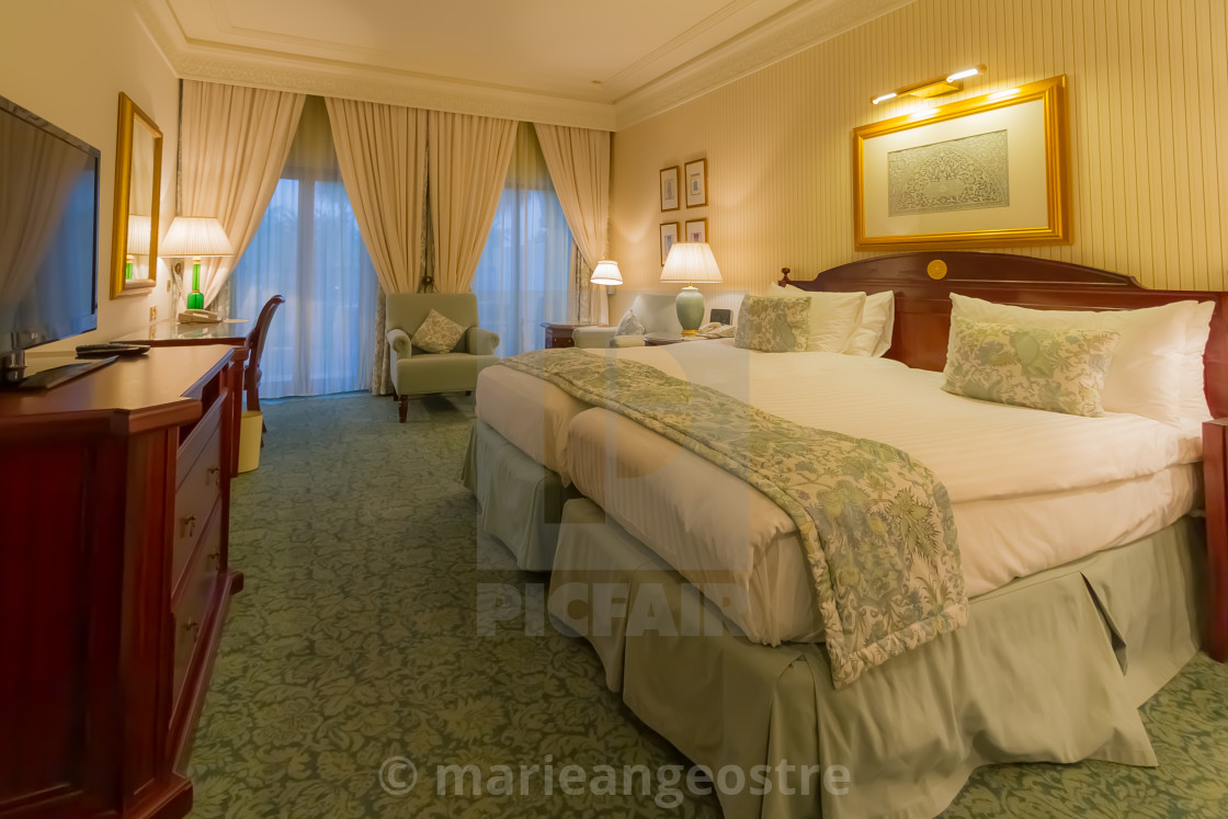 "Oman, bedroom in luxury 5 star hotel Ritz-Carlton Al Bhustan" by - $8.89 "Oman, bedroom in luxury 5 star hotel Ritz-Carlton Al Bhustan" stock image