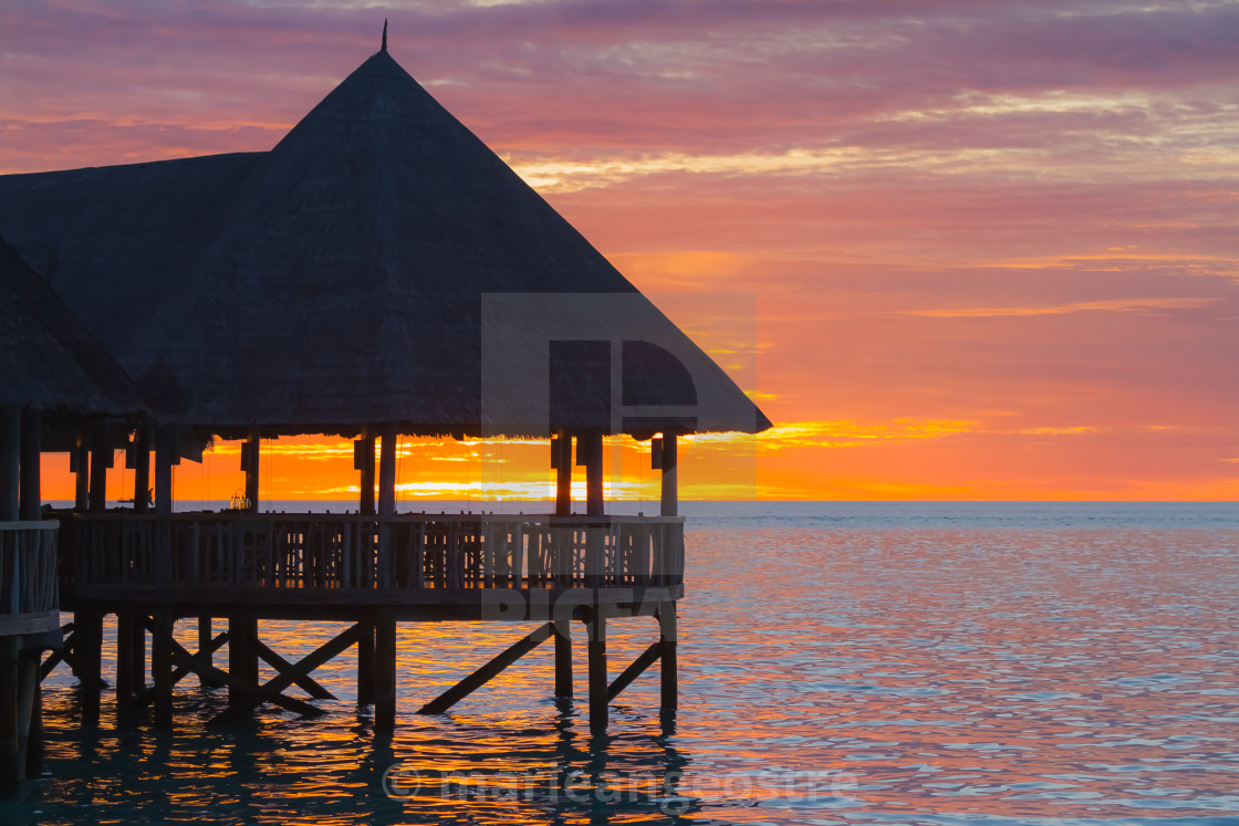 "Maldives, sunset on the Lankanfushi luxury hotel (ex Soneva Gili)" stock image