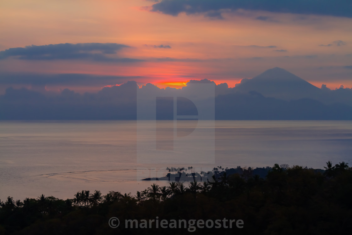 "Sunset on the Mount Agung volcano, from Lombok island, Indonesia" stock image