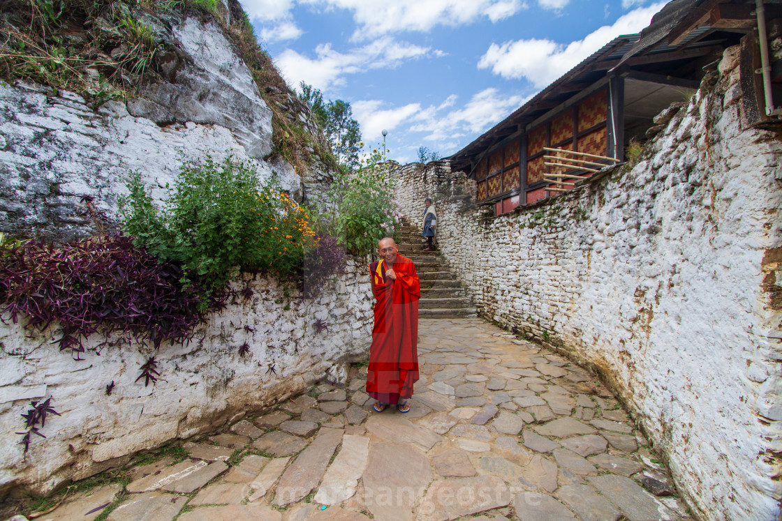 "Bhutan, guided by a Buddhist monk in Lhuentse monastery" stock image