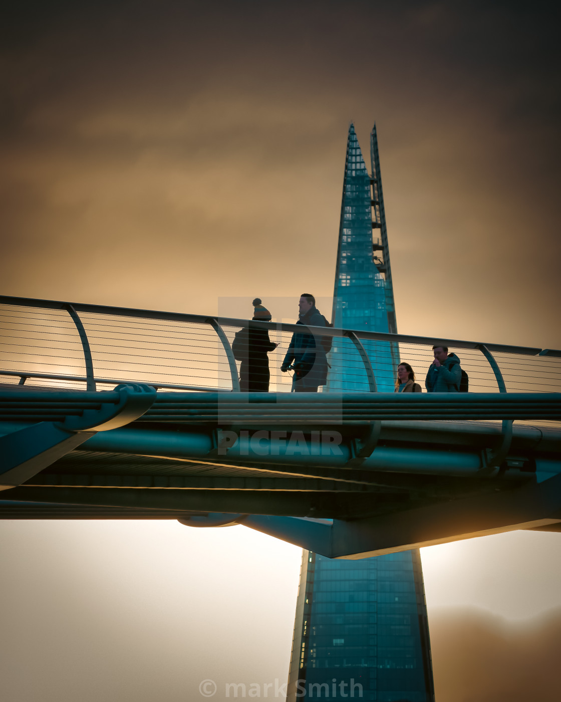 "millennium bridge in winter light" stock image