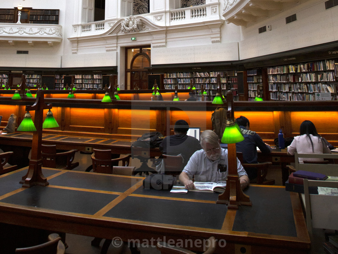 "Man reading literature" stock image