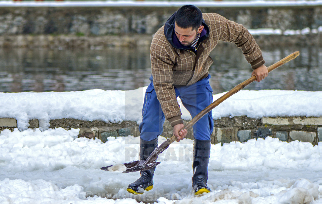 "A Government hired snow cleaner." stock image