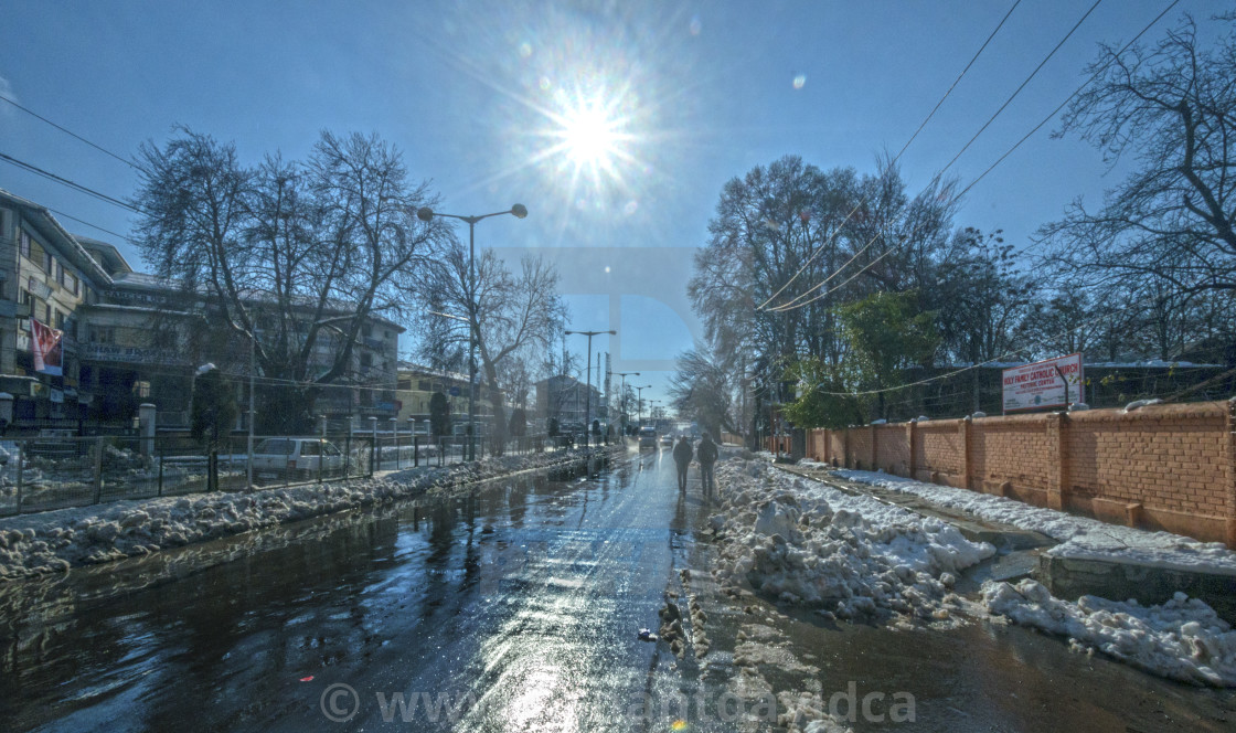 "A ROAD FLOODED WITH MELTING SNOW" stock image