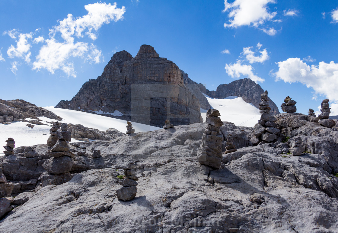 Snowy Mountain With Rocks In Foreground License Download Or Print For 17 36 Photos Picfair