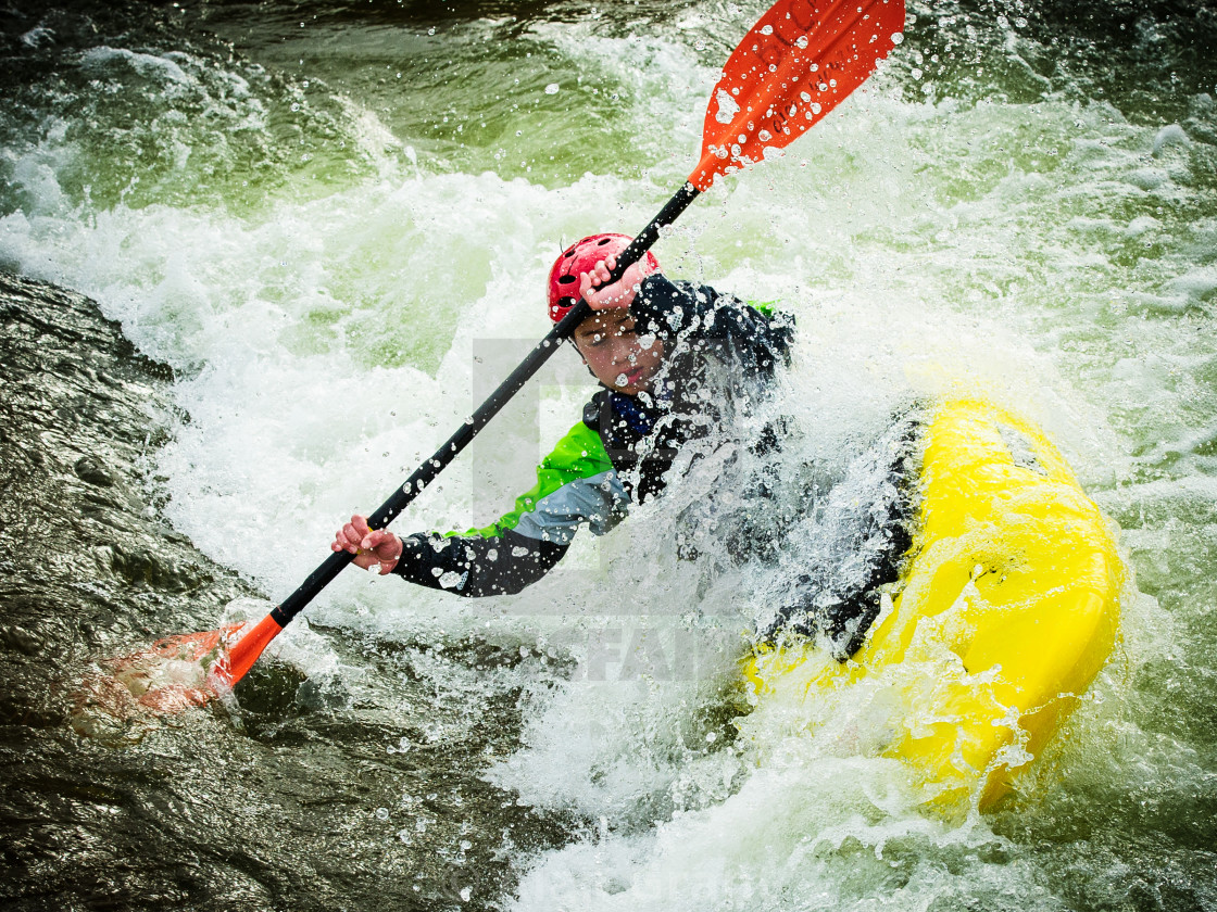 "Kayak trying to stay upright" by Alan Grant - $15.19 "Kayak trying to stay upright" stock image