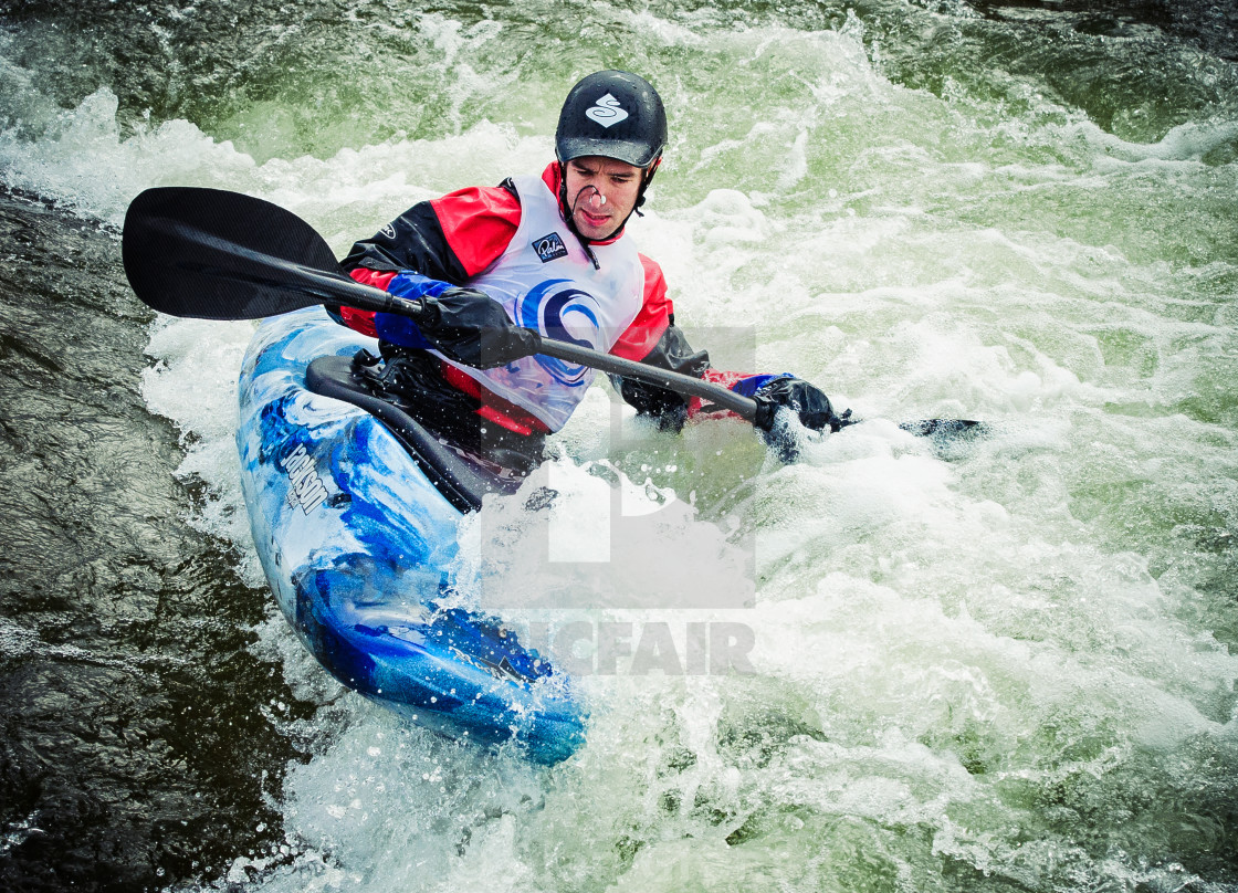 "Kayaking against the flow" by Alan Grant - $15.18 "Kayaking against the flow" stock image