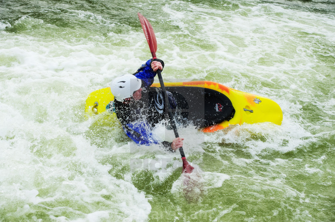"Kayak turned by the water" by Alan Grant - $15.18 "Kayak turned by the water" stock image