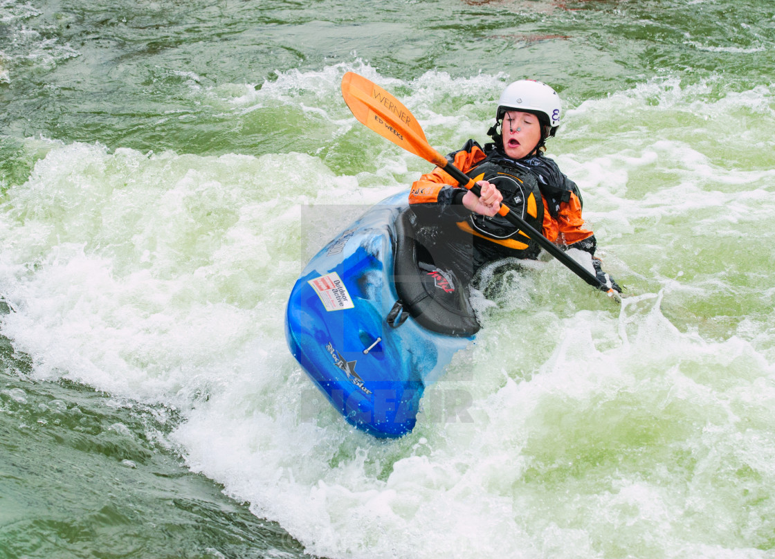 "Kayaker paddling against the flow" by Alan Grant - $15.29 "Kayaker paddling against the flow" stock image