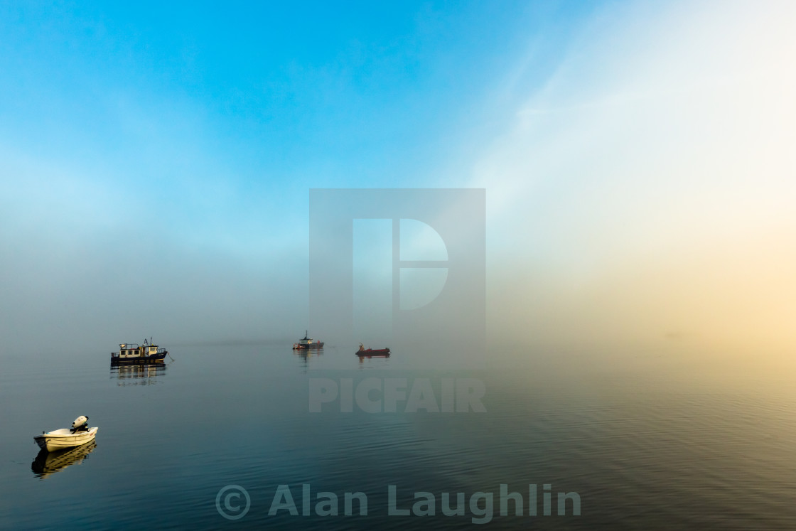 "Fishing Boats in Fog" stock image