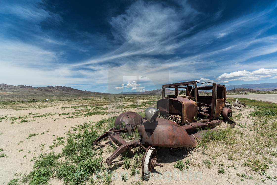 "Vintage Car on The Loneiest Highway" stock image