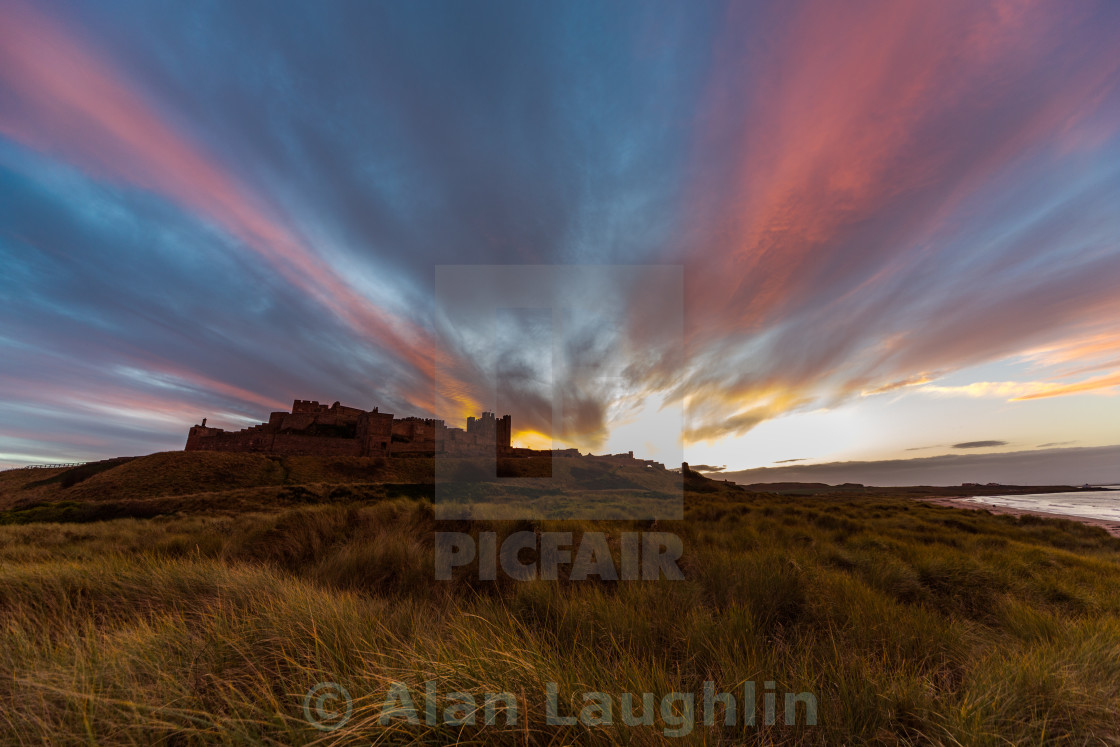 "Bamburgh Castle sunset" stock image