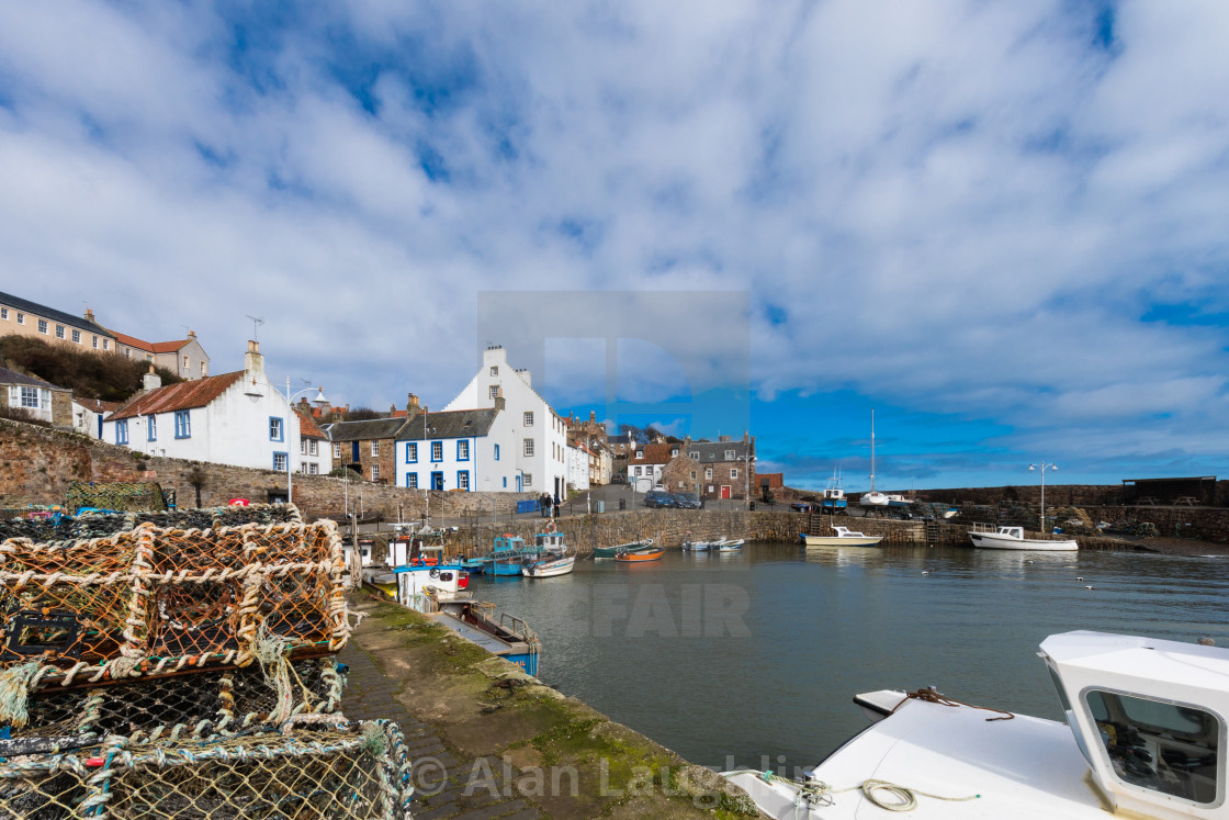 "Crail harbour Fife with creel's in foreground" stock image