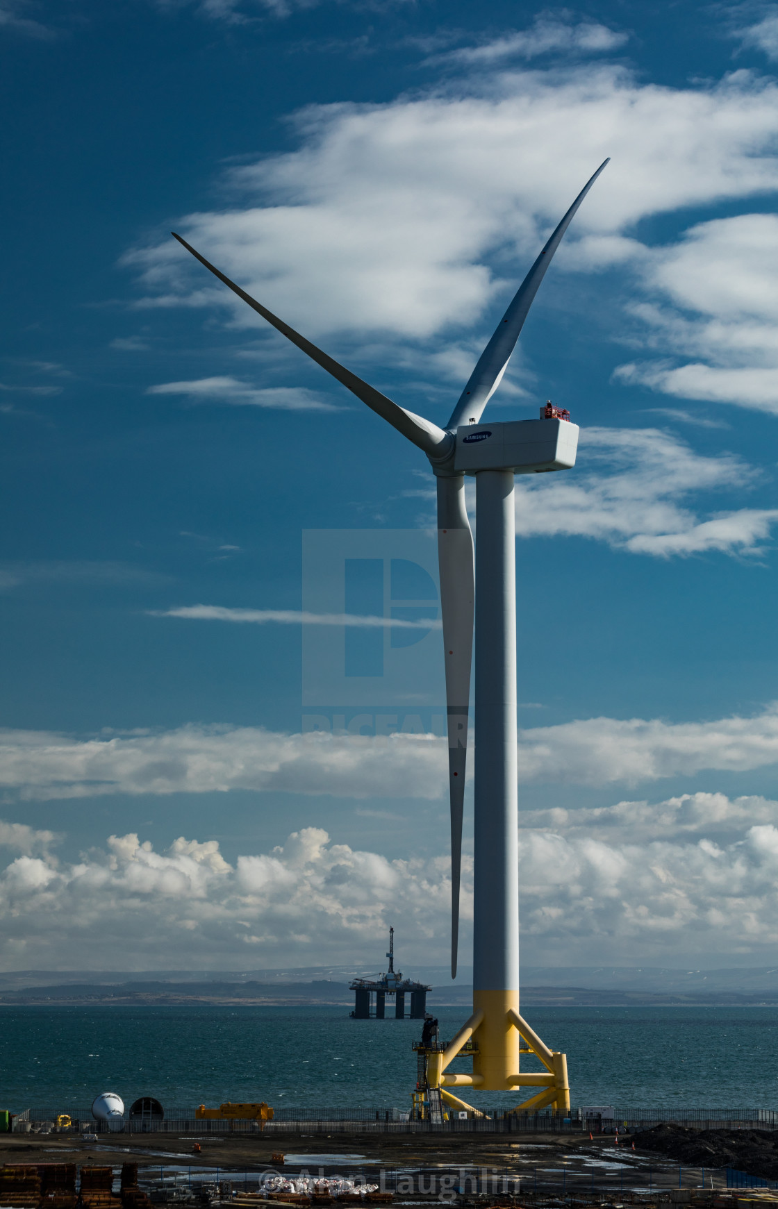 "Wind Turbine and Oil Rig" stock image