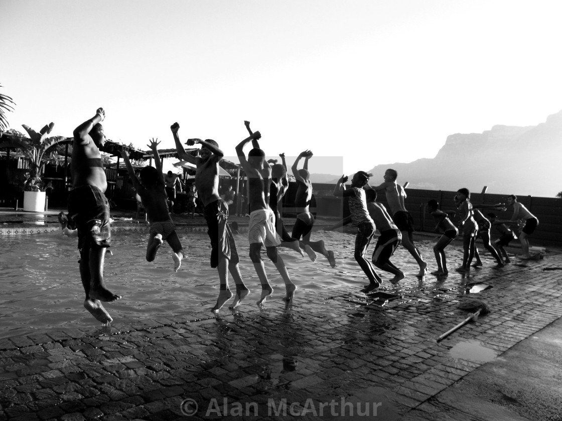 "Kids at Play" by Alan McArthur - $77.88 "Kids at Play" stock image