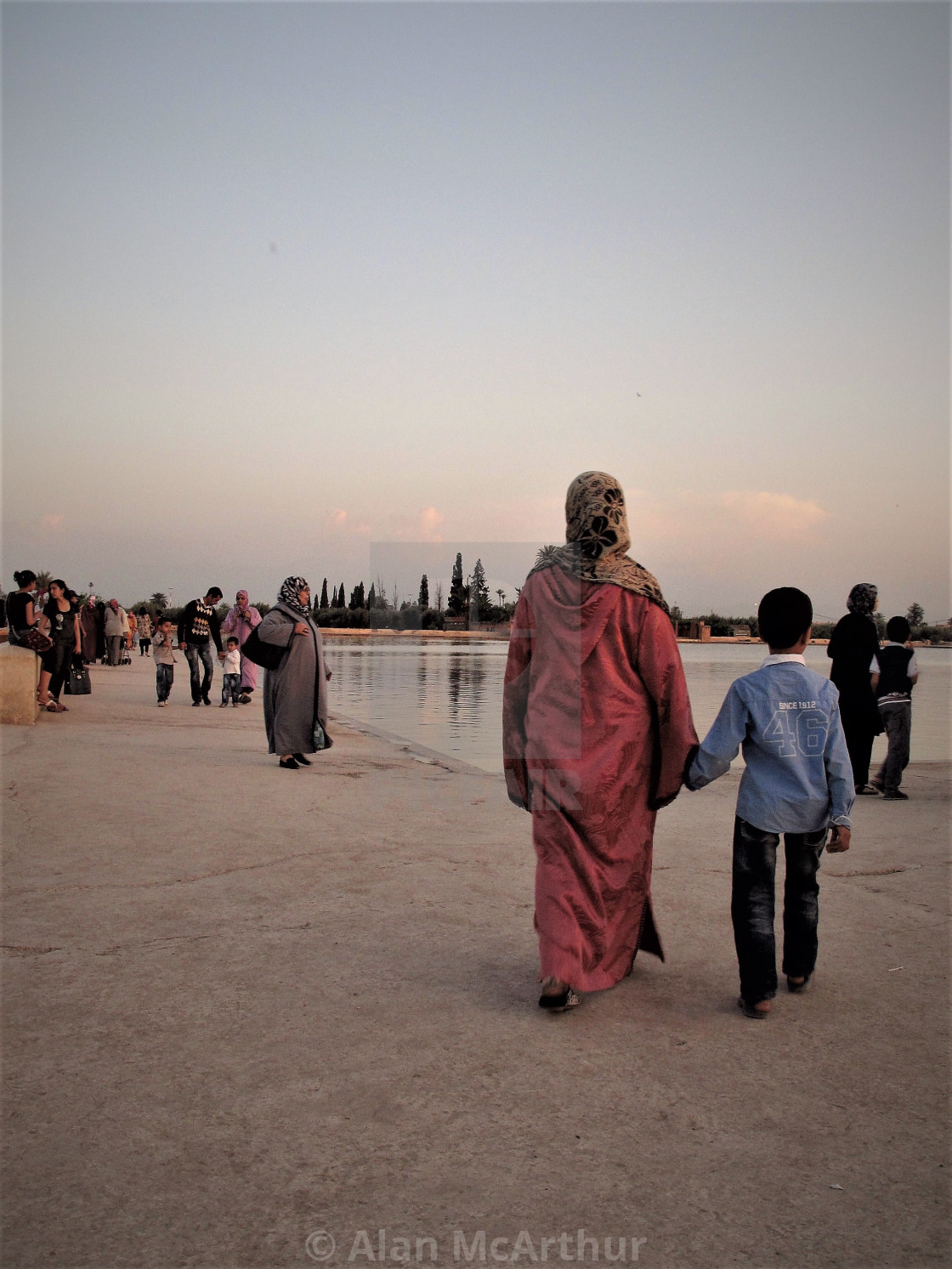 "Evenings in Marrakech at Menara" by Alan McArthur - $76.83 "Evenings in Marrakech at Menara" stock image