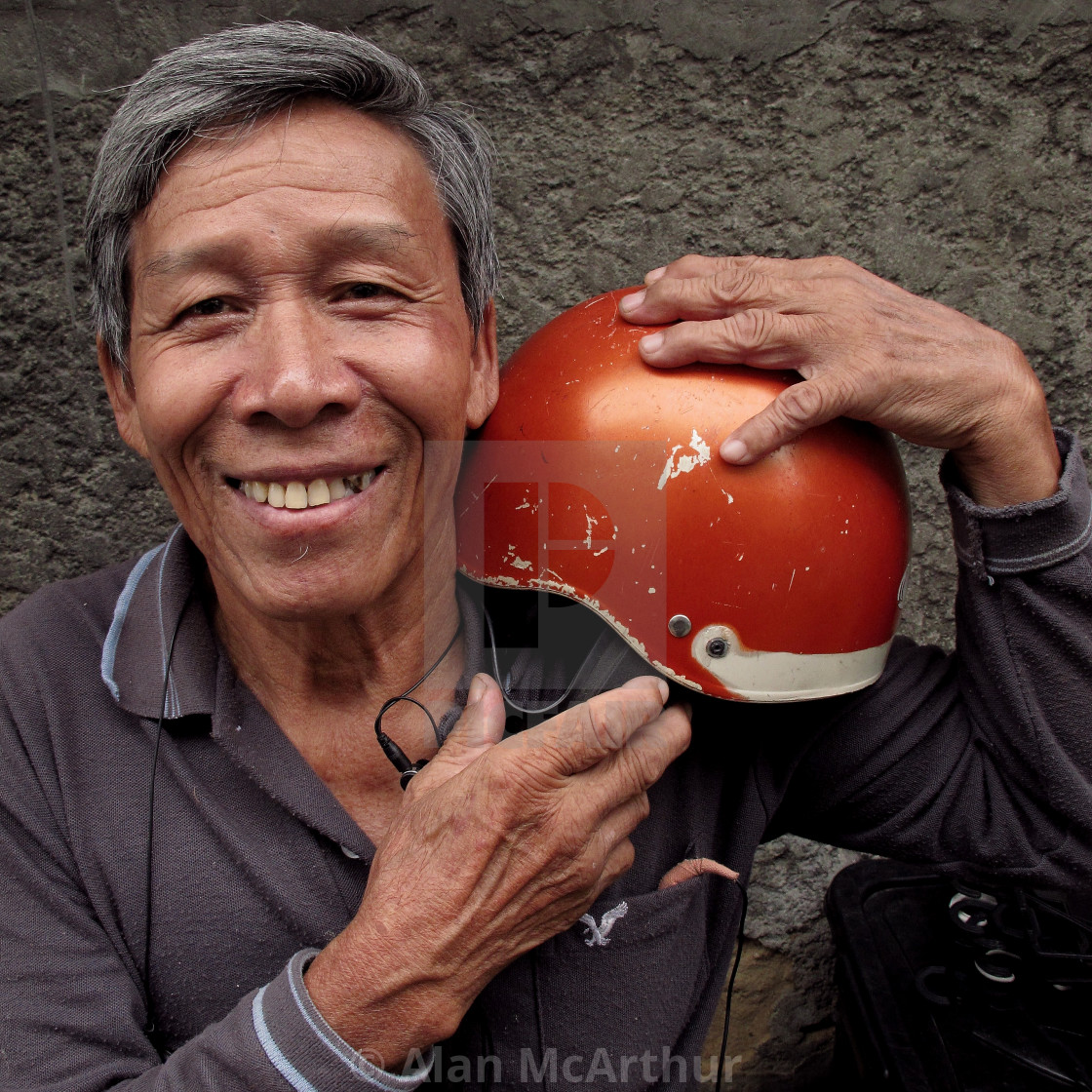 "Thai Man with his Helmet" by Alan McArthur - $77.88 "Thai Man with his Helmet" stock image