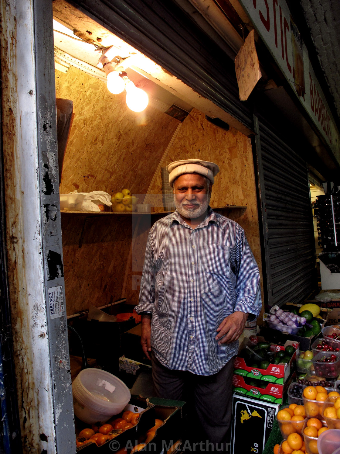 "Brixton Market Fruit and Veggies with Indian Shop Ownerr" by Alan McArthur - $76.83 "Brixton Market Fruit and Veggies with Indian Shop Ownerr" stock image