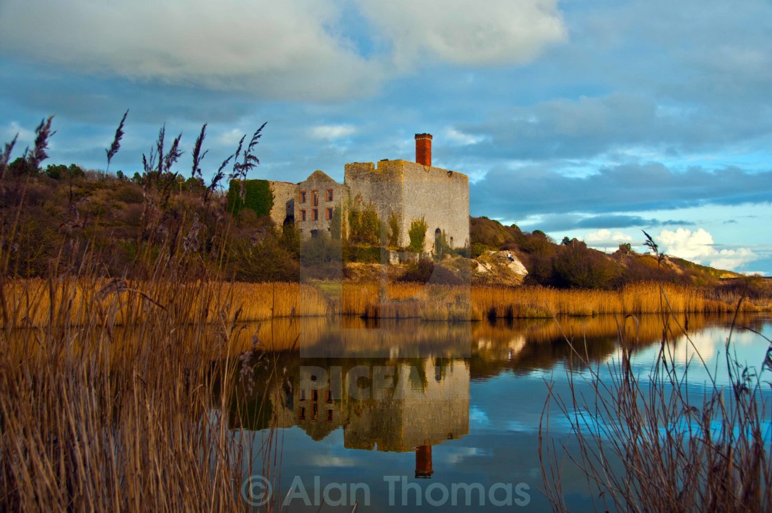 "An old lime kiln next to a small lake at Aberthaw, Vale of Glamo" stock image