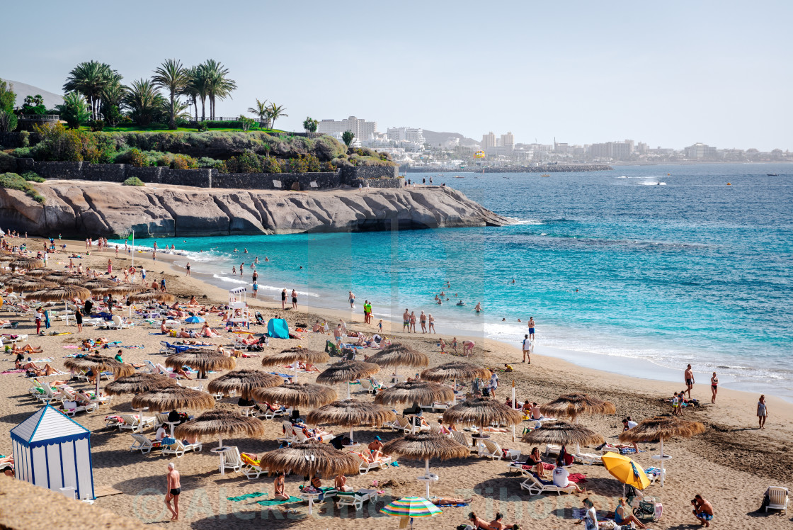People Sunbathing On The El Duque Beach Tenerife License
