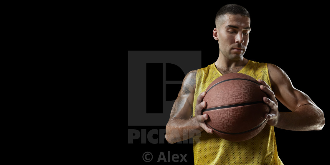 Basketball Player On A Black Background License Download Or