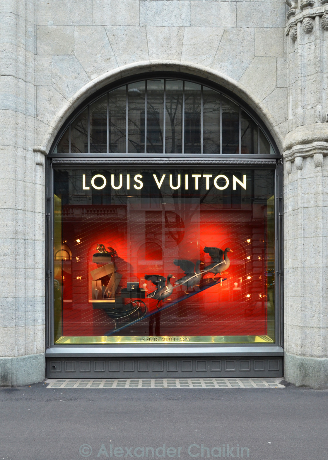 ZURICH, SWITZERLAND - DECEMBER 29, 2013 - Louis Vuitton shop, well known  for its luxury trunks, leather goods, shoes, watches, jewelry and  accessories - License, download or print for £6.20, Photos