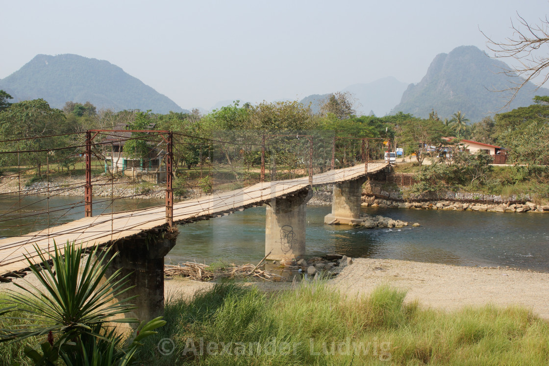 "Chain Bridge, Vang Vieng, Laos, Asia" by Alexander Ludwig - $6.29 "Chain Bridge, Vang Vieng, Laos, Asia" stock image