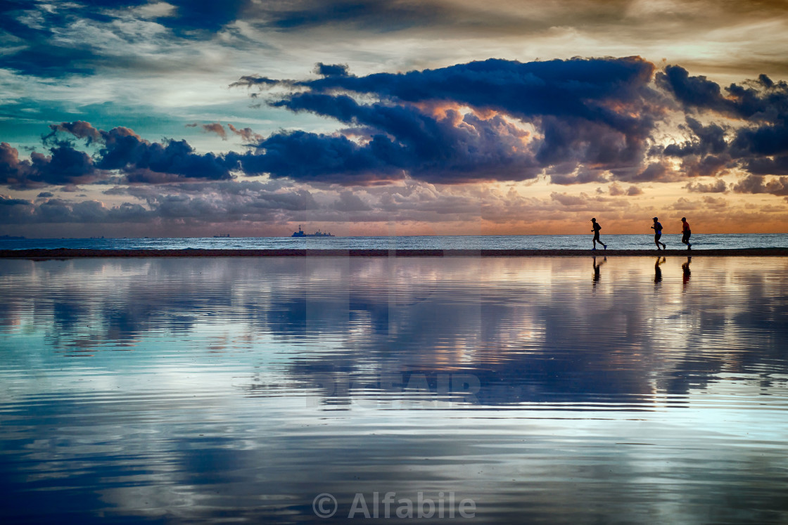 "Running at dawn" stock image