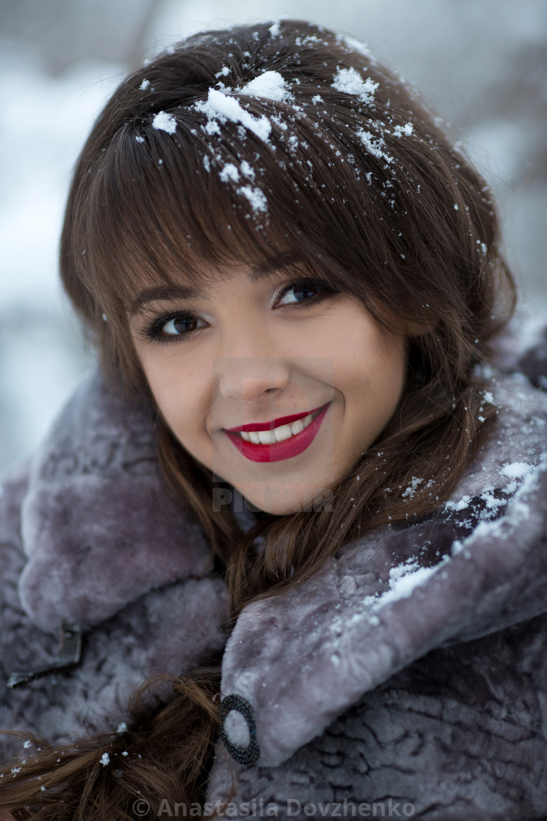 Beautiful Portrait Of Cute Cutie Nice Adorable Delightful Beautiful Cheerful Smiling Happy Excited Natural Girl With Very Cute White Healthy Smile Dentist Cosmetics Makeup Ice Snow Snowflakes In Hair License Download