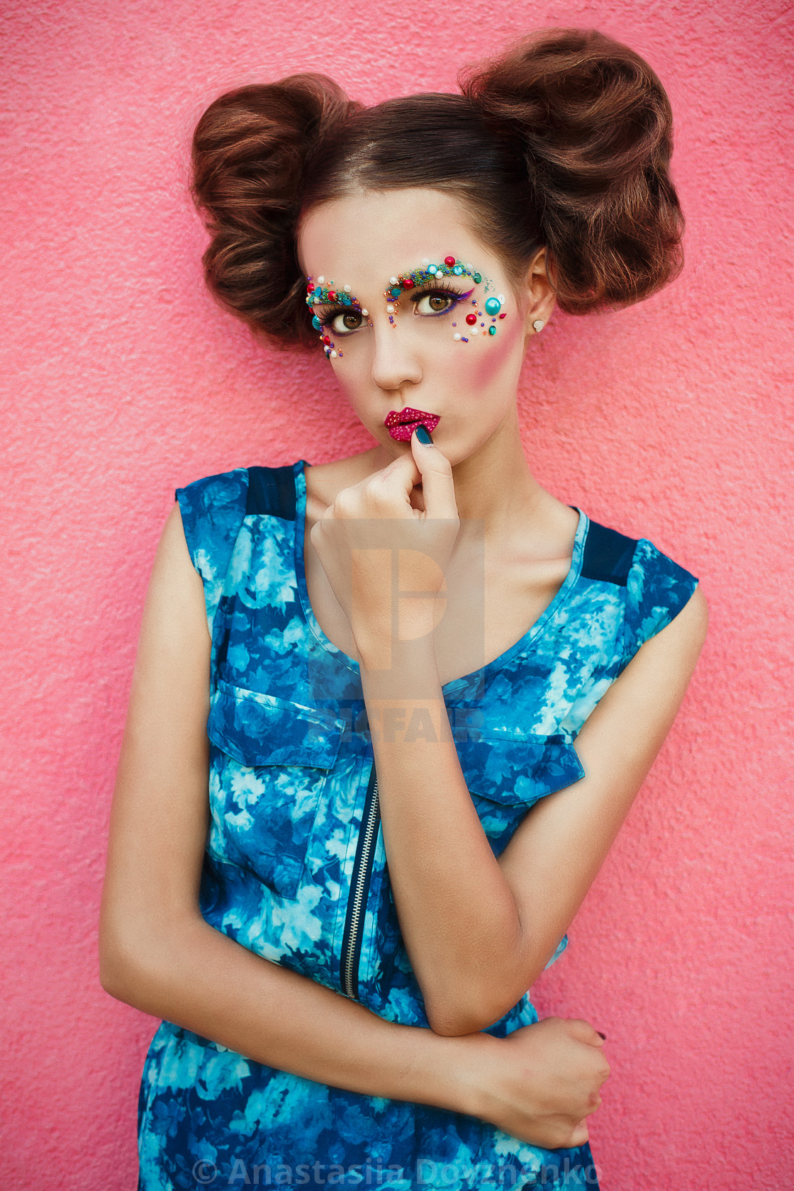 Fashionable Image Of Fashionable Model With Two Hair Bun And